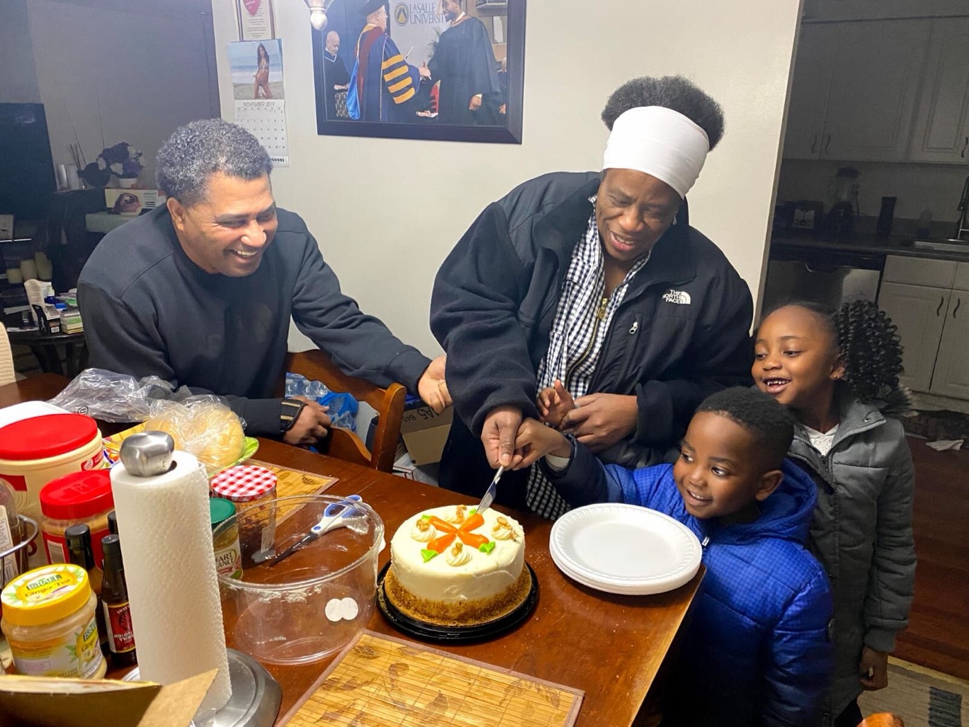 A family sharing a celebration at home